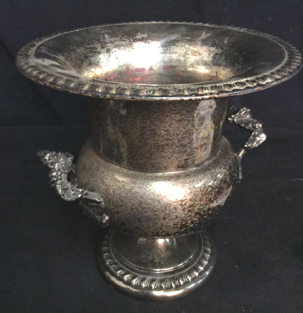 SHERIDAN Silver Plate on Copper Pedestal Vase: SHERIDAN Silver Plate on Copper Pedestaled Vase. Pedestal vase with handles and wide mouth. Silver plate on copper. Handles with dimensional grape vine design. Vase planter, ice bucket., wine bucket, 