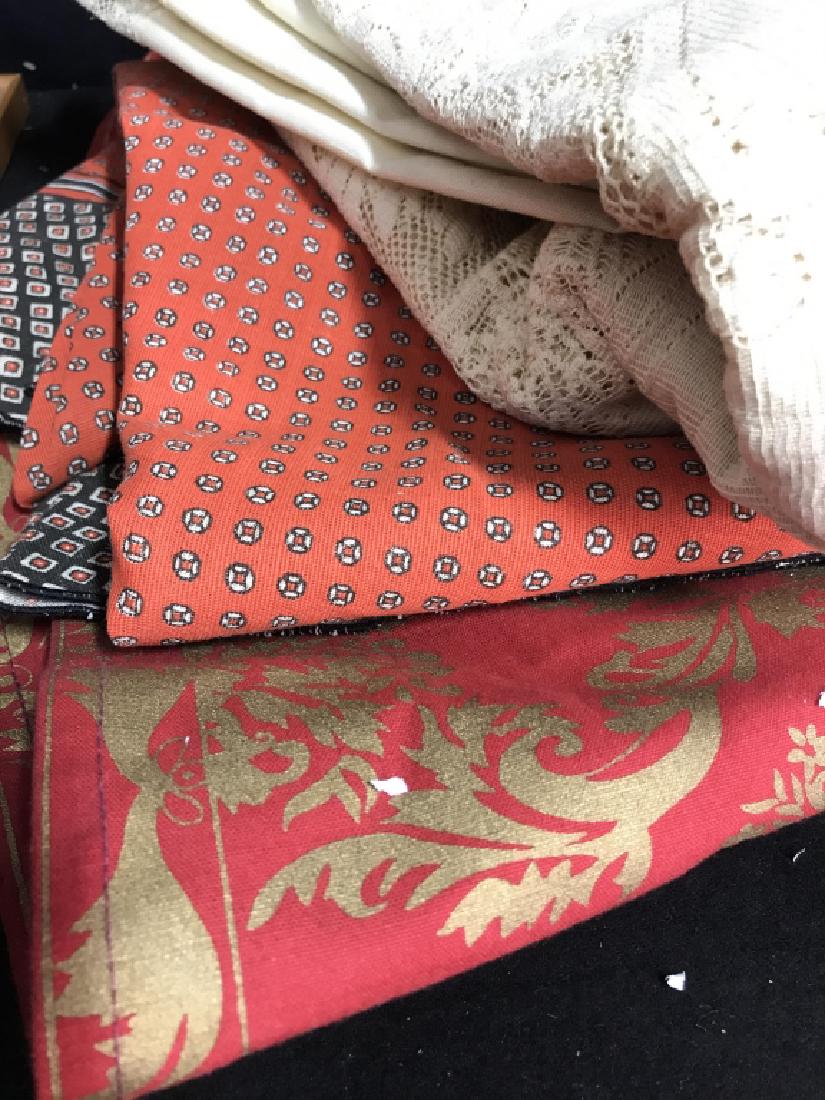 Group Lot of Various Linens 2+: Various linens in group Lot. Tones include red, orange, beige, gold and black. Various patterns. Various sizes, not measured., cleaned and pressed