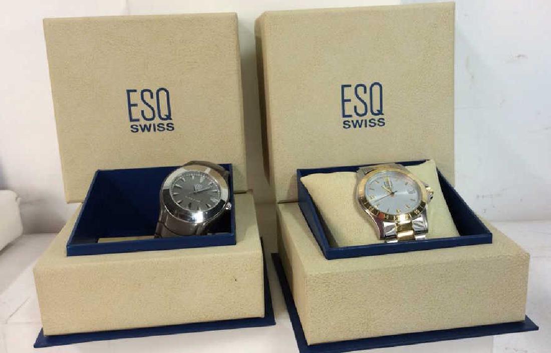 Pair ESQUIRE SWISS Men’s Wristwatches: Pair ESQUIRE SWISS Men’s Wristwatches with original boxes. Each watch also comes with extra links. One grey toned, titanium and stainless steel wristwatch, marked on back as ESQ SWISS E5083. One sil