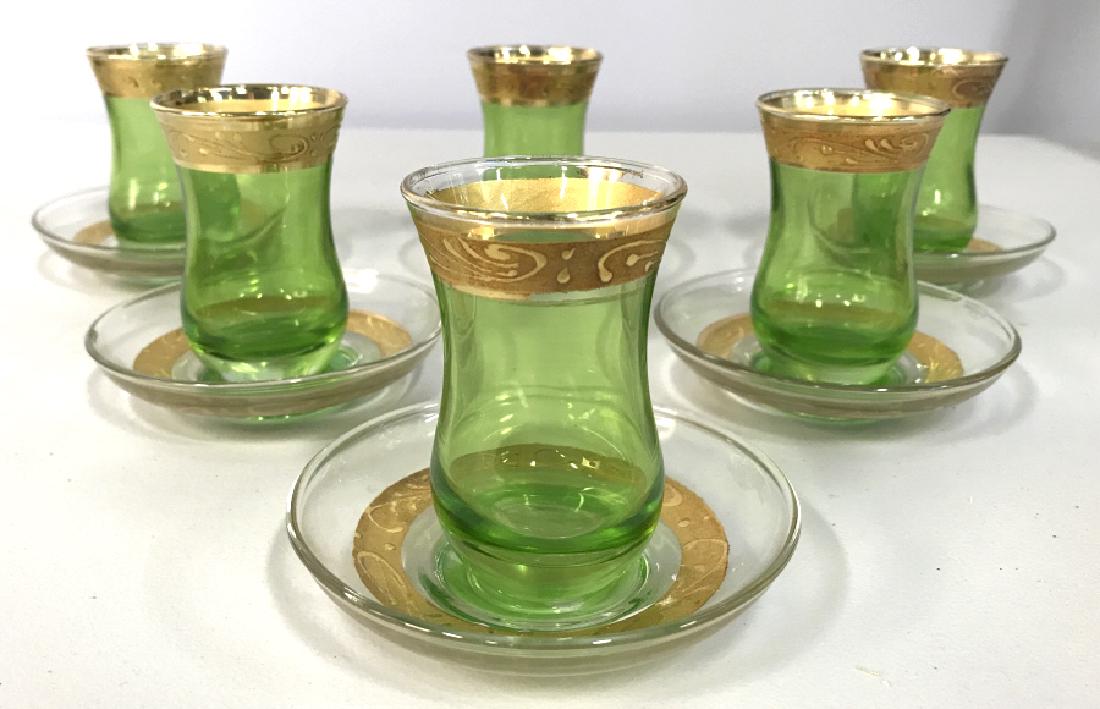 Set 12 Green & Gold Toned Bohemian Cordial Glasses: Set 12 Green & Gold Toned Bohemian Style Cordial Glasses. Six green toned glasses w gold toned painted trim and six coasters in green and clear glass w gold toned painted circular design. Green tone m
