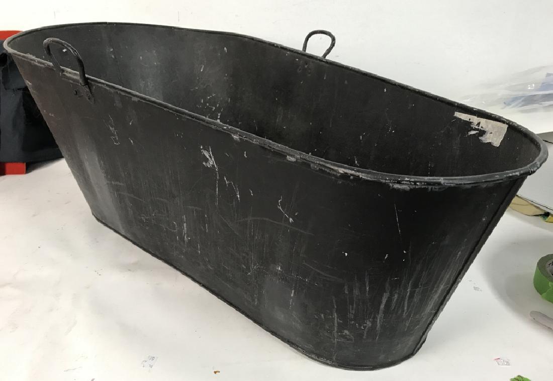 Vintage Black Toned Metal Tub: Piece is black toned and metal contains one handle on each side. Contains evident wear. Measures approx 34 inches long 17.5 inches wide, 11.5 inches tall. Farmhouse decor, vintage decor, home accessor