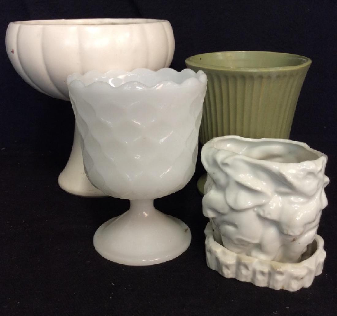 Lot 5 Vintage Glass And Ceramic Planters: Lot 5 Vintage Glass And Ceramic Planters. Various materials including milk glass, earthenware and ceramics. Various sizes and motifs. Tallest measures approx 8 in tall by 7 in in diameter. Some surfac