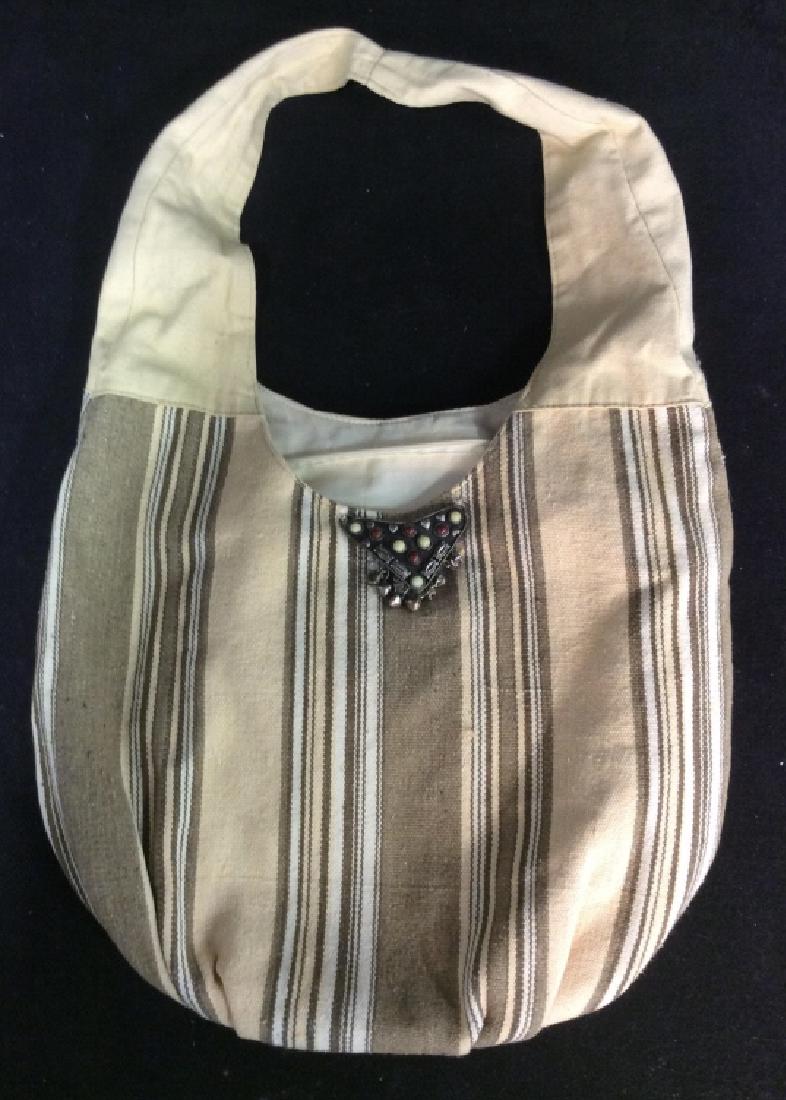 Bejeweled Linen Tote Bag: Shoulder bag, carry all, striped linen exterior inside nylon, decorative silver toned Broach attached, jewelry, pin length app 3 inches, bag measures ht 21 inches width app 14 inches shoulder bag, car