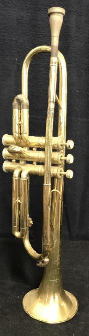 Pedlers Brass Trumpet Instrument: Musical Instrument, Brass Trumpet, marked Harry Pedler and Sons, Elkhart Ind, USA, rim has minor dent, measures app 21 inches length. Collectible, instrument, musical instrument.
