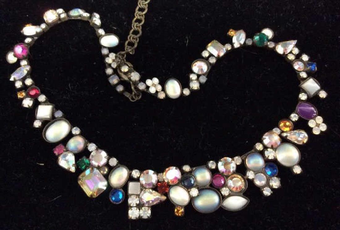 Sorrelli Vintage Rhinestone Necklace: Signed Sorelli vintage rhinestone gilt Metal necklace with costume, faux stones in the style of opals, moonstone, and rhinestones, good condition commensurate with age, signed on raised tablet, approx