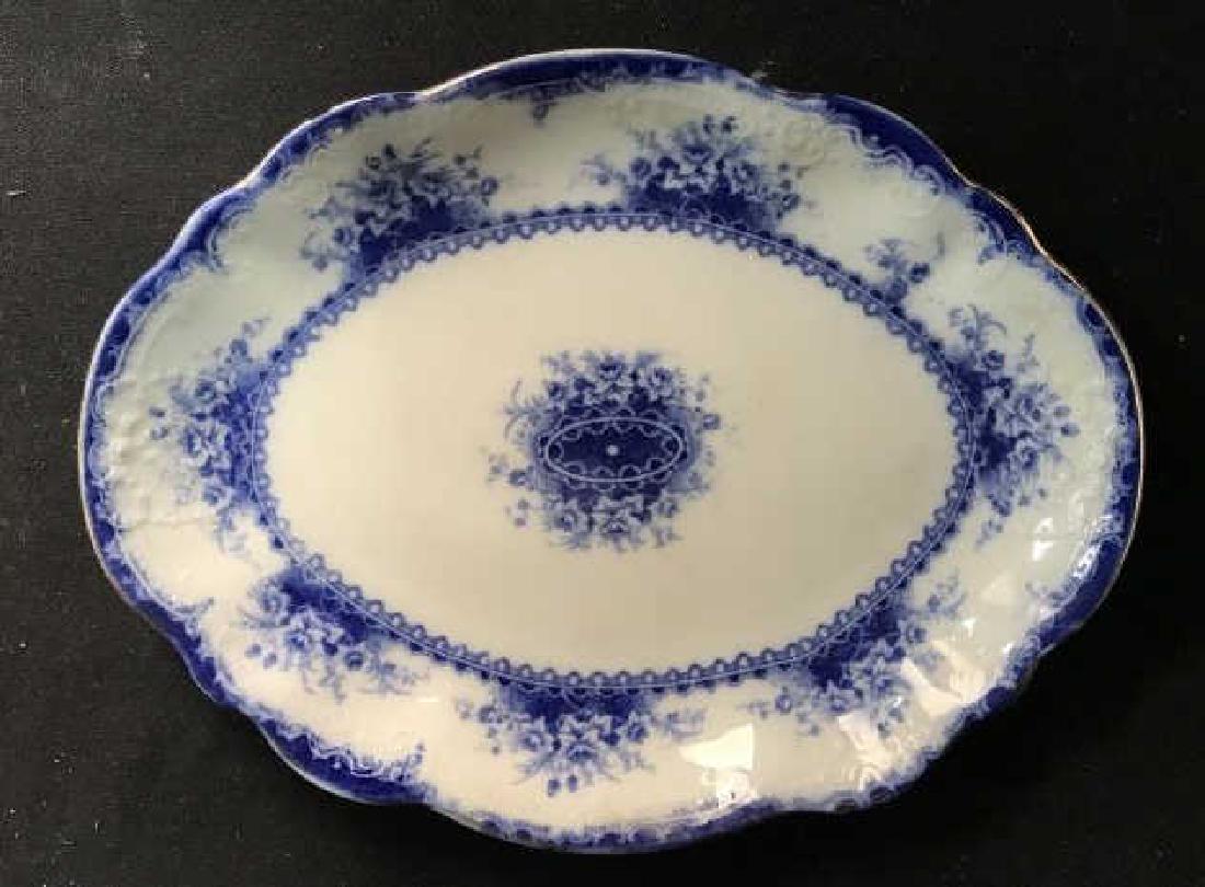 English Blue White Porcelain Plate: English porcelain plate blue and white pattern measures app 10.5 inches by 8 inches, marked underside, decorative tableware