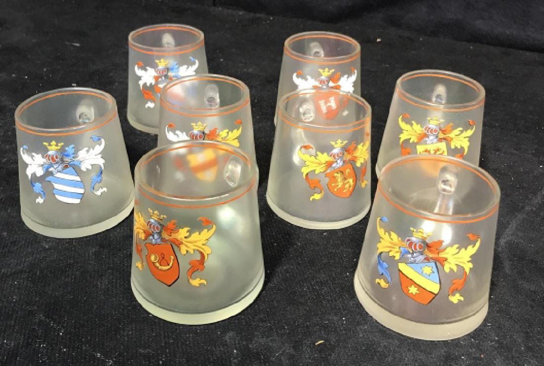 Group Lot Poss Venetian Wine Cups: Group of 8 possibly Venetian wine mugs each decorated with a possibly hand painted coat of arms and orange band at lip. Each approx 3 inches tall with a thumb handle, no condition issues noted, no vis