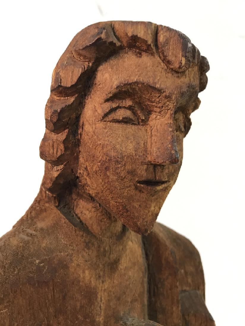 Antique Carved Wood Santos Sculpture: Carved wood sculpture saint with hands clasped in parlayed, antique carved religious figural, religious iconography, religious sculpture, religious artwork, some wear to wood, measures ht 20 inches, 8