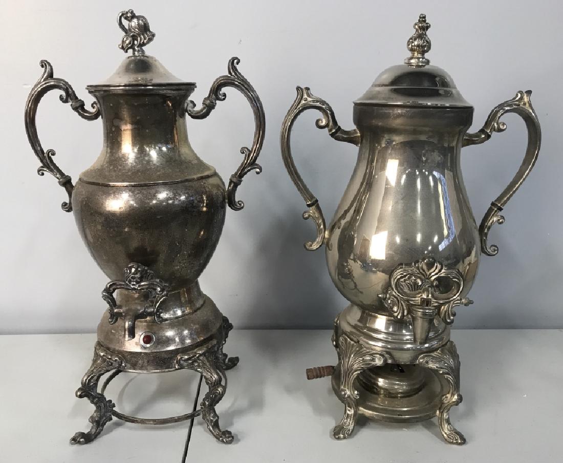 Lot 2 Vintage Lidded Silver Toned Samovar: Samovars, One is labeled ELEGANCE SILVERWARE on underside. Both piece have 4 legs and lids. One lid needs repair. Both Need cleaning. Each contain c curve detail. One lid needs repair. Tallest measure