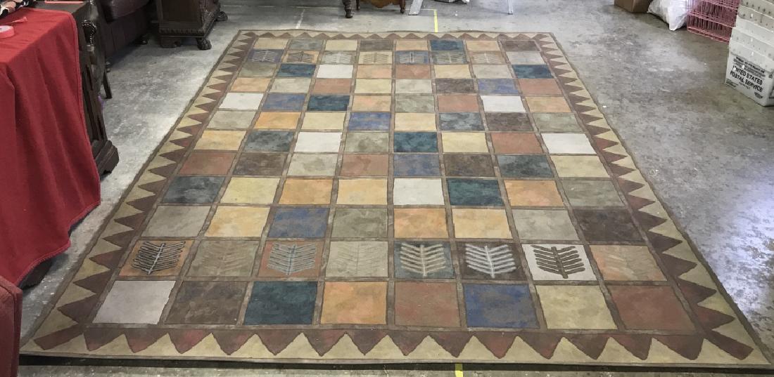 LAMONTAGE Blocked Cy Rug Einstein and Moomjay: Label on underside reads LAMONTAGE. Needs Cleaning Measures approx 8.25 feet wide by 11.5 inches long. Contains geometric square detail. Contains tones of red,orange, blue, brown, green , slate, Suede