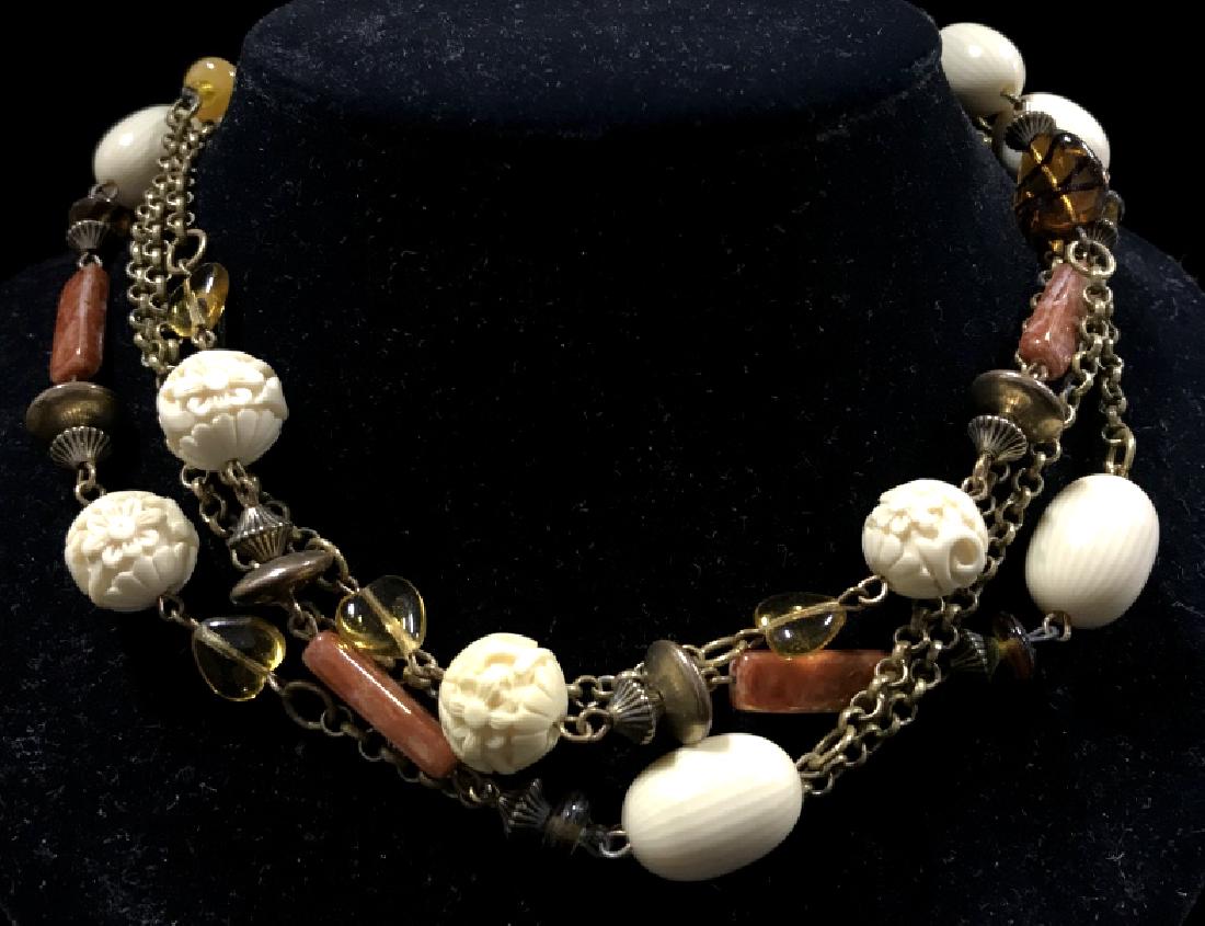 Carved Bakletite Bone & Natural Stone Necklace: Carved Bakletite Bone & Natural Stone Beaded Necklace with brass toned metal change, carved bone, possibly faux bone floral motif beads, beige toned Bakelite beads, and red toned poss natural stone be