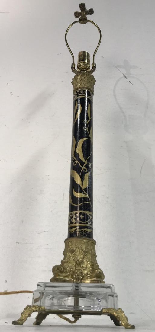 Black & Gold Toned Hand Painted Metal Lamp: Lamp is metal & black and gold toned. Contains hand painted leaf and vine detail. Measures approx 7 inches square, 35 inches tall. Home decor, home accessory, home lighting.