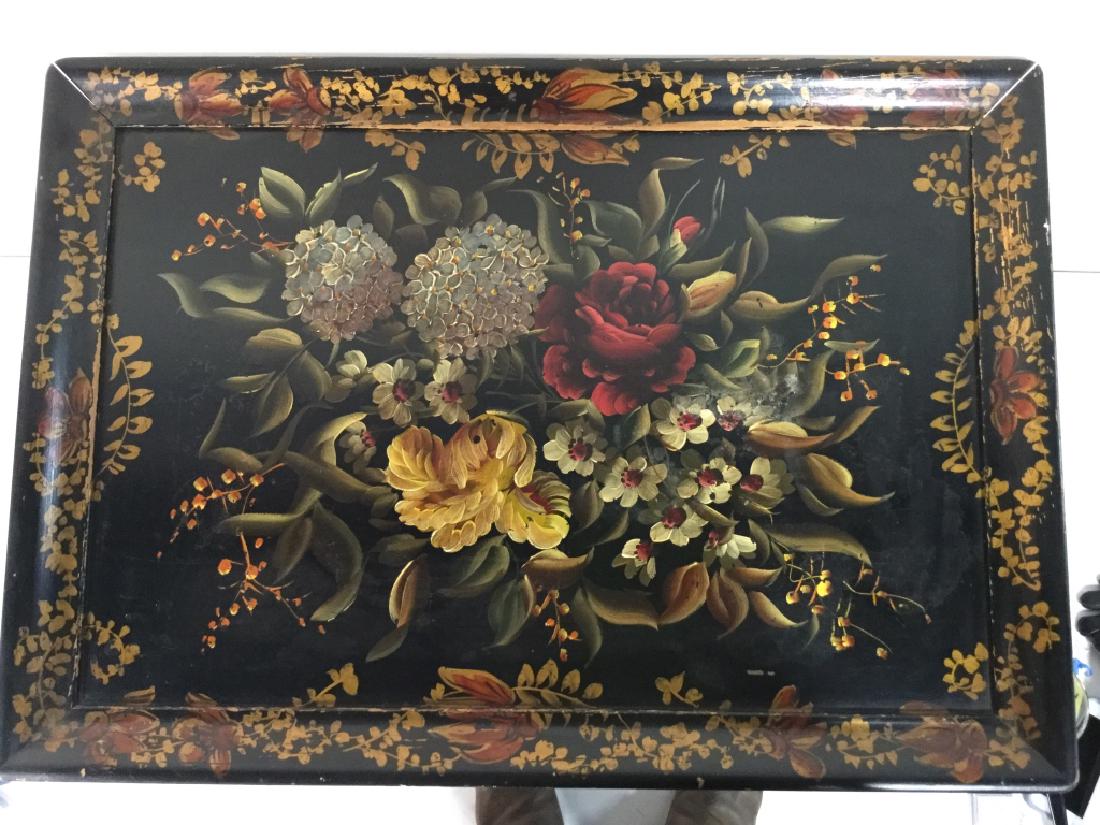 Painted Tray With Luggage Stand: Painted Tray with Luggage Stand can be used as either a Decorative Tray or a Tray Table, overall Measurements Of Tray approx 27 in X 19 in, Tray Painted black with flowers and gold tone ornaments, Sta
