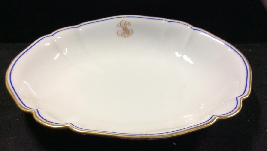 Blue White Gold Porcelain Serving Bowl, France: Porcelain marked for hand painted in French, good condition, measures ht app 2 inches, 11 by 9 inches, tableware Tableware, serviceware, dinnerware, decorative tabletop accessories.