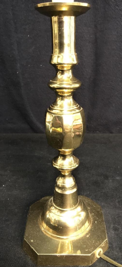 Gold Toned Poss Brass Candlestick Lamp: Gold Toned Poss Brass Candlestick Lamp. Measures approx 25 inches tall 4.5 inches square. Table lamp, home lighting, home accessory.