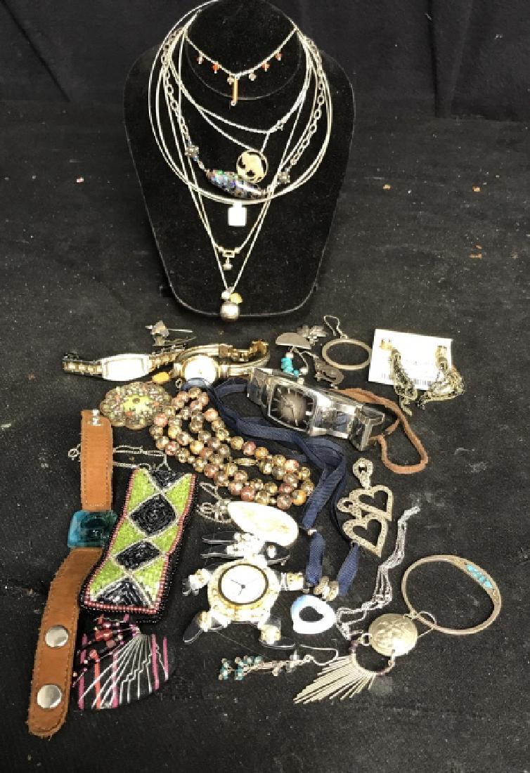 Group Vintage Sterling Jewelry plus: Four necklaces marked for 925 Sterling Silver, necklaces with pendants, beads, natural stone necklace apple necklace Buffalo marked five cents necklace, Signed craft puns, hand beaded bracelets, leath