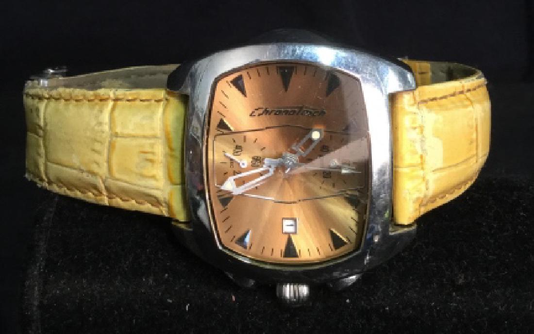 CHRONOTECH 2185 M Wristwatch: Yellow leather band with deployment Buckle, oversized watch face measures app 2 inches by 1.5 inches, faceted glass on face, shimmery copper dial, heavy stainless steel casing, adjustable wrist size, 