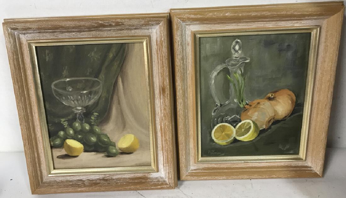 Pair of Oil on Board Still Life Paintings: Pair of Oil on Board Still Life’s one of lemons and grapes and a crystal glass, not signed, the other of lemons with onions and a crystal pitcher, signed N Zeim on lower right, each framed in blond 