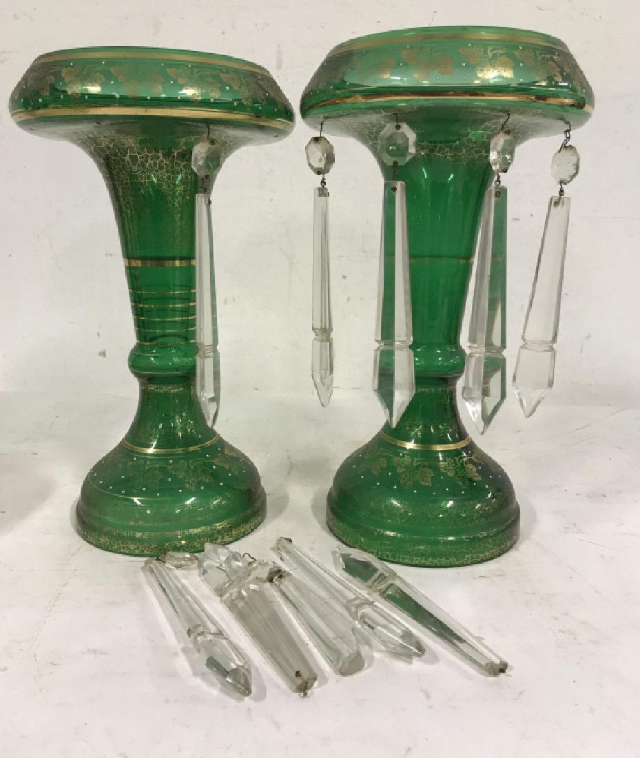 Ornate Green & Gold Tone Glass Table Ornaments: Ornate green tone glass table ornaments with gold embellishments and hanging crystal pendants. Ornaments could be used as shades for candle / lamp or as is for decoration. Ornaments are hollow and hav
