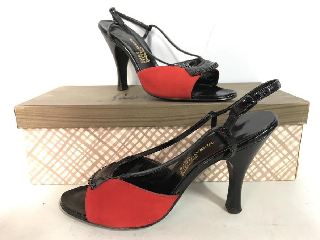 SAKS FIFTH AVENUE FENTON LAST Heels 7 1/2: Soles of shoes read SAKS FIFTH AVENUE FENTON LAST. Shoes are red and black toned heels appear to be 4 inches. Includes box. Shoes are size 7.5. Contains some minor wear. Women's fashion accessories, d