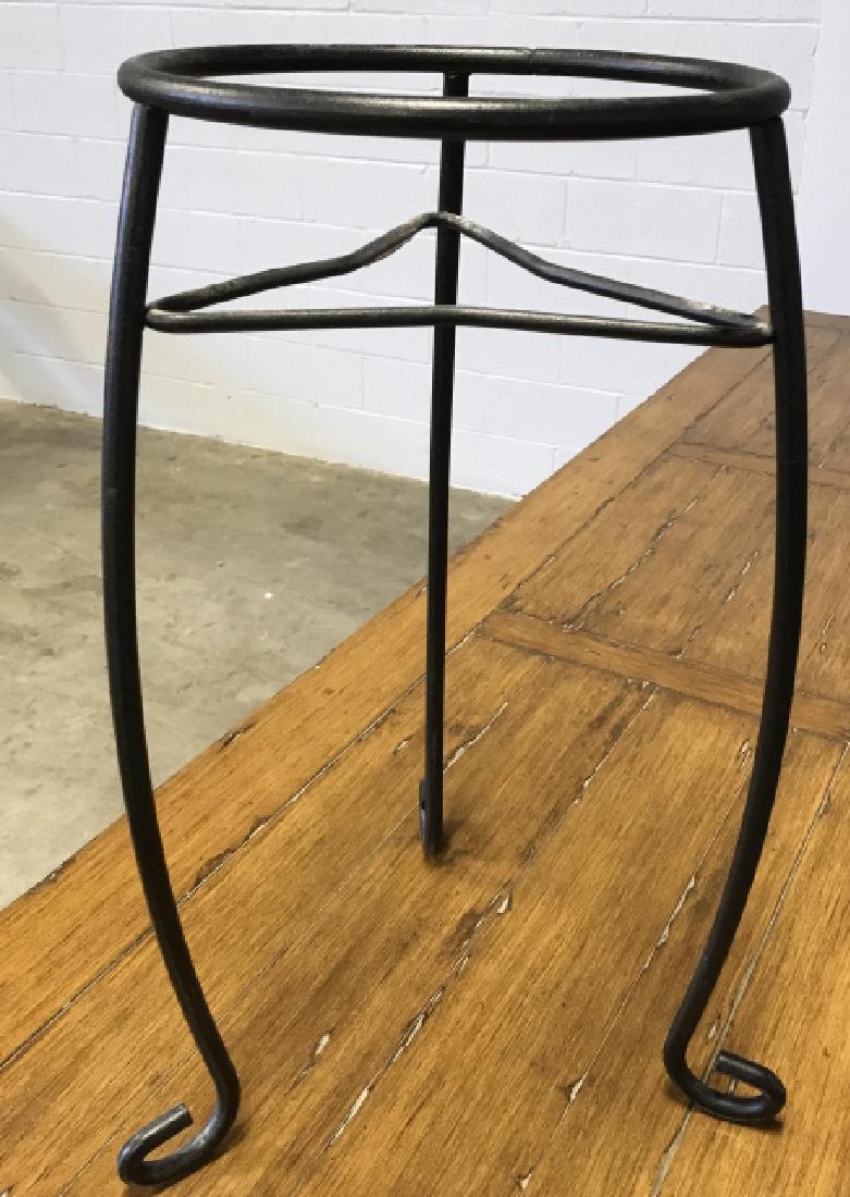 Black Toned Metal Plant Stand: Black Toned Metal Plant Stand. Iron plant stand. Hand Formed Plant Stands. Metal work plant stand. Indoor outdoor, garden accessory, Measures approx 21 inches tall x 12 inches in diameter. No conditio