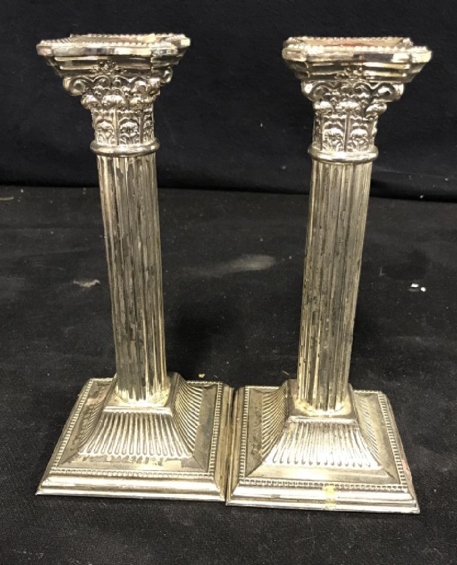 Pair of Silver toned Candlesticks (1 of 8)