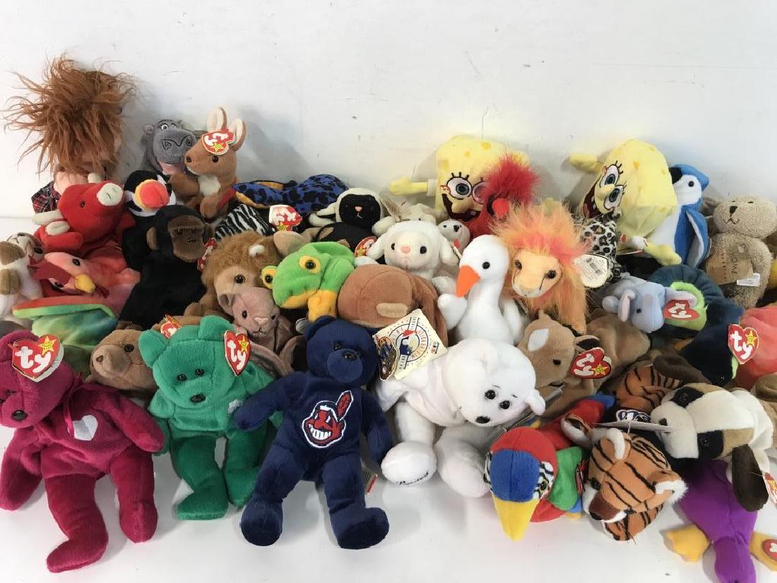 Group Lot of Various Beanie Babies Collectibles: Group Lot if various beanie babies, some vintage, some more contemporary. Lot includes 4 collectible bears. Largest beanie baby, the I Love NY Limited Edition Bear, is approx 10 inches in length 5.5 i