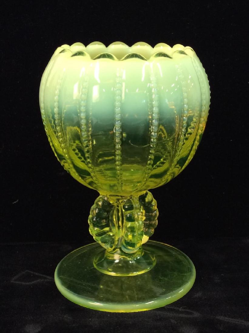 Yellow Toned Pressed Vaseline Glass Vase: Yellow Toned Pressed Vaseline Glass Vase, vase with scalloped edge, textured circle motif ridges, and pedestal base. Vase vessel, decorative tabletop accessories, tableware, decorative glass, home dec