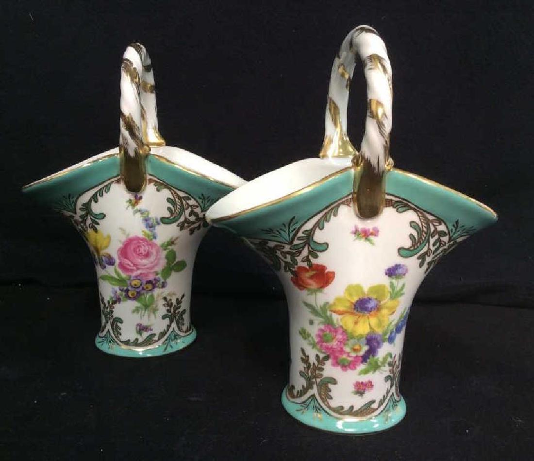 Pair of ROYAL EUROPE Hand-Painted Basket Vases: Royal Europe Peinte a la Main Porcelain Basket Vase with Hand Painted Floral Designs and Gold Gilt Accent Trim. This porcelain basket vase features colorful hand painted floral bouquet designs on fron