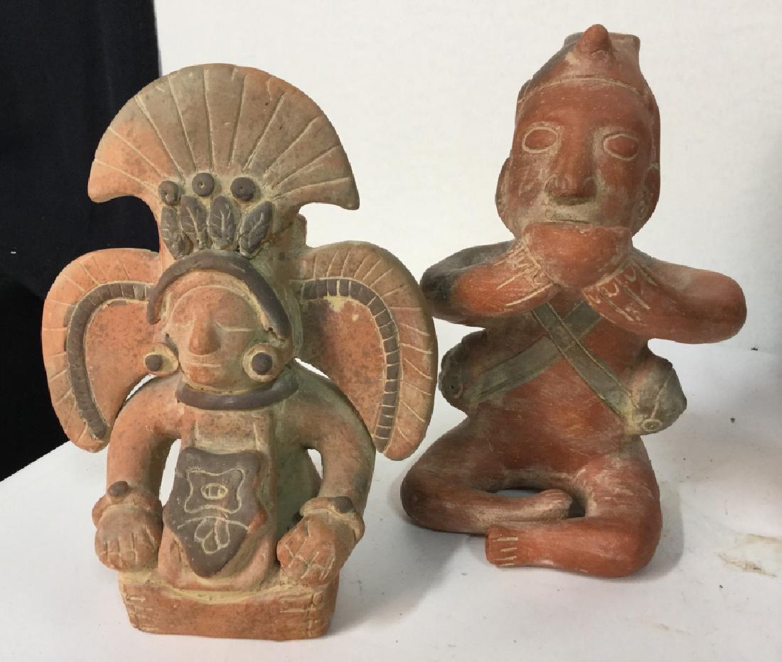 Pre Columbian Style Terra-cotta Figures: Pre Columbian Style TerraCotta Figures, 1 seared with ornate headdress, the other seated cross legged with vessel raised above, Largest 5 in x 9 3/4 in, Precolumbian Style Decorations, Decorative Indi