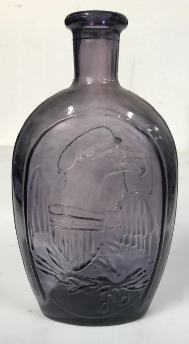 Amethyst Eagle Relief Glass Bottle: Vase, decorative tableware, table top accessory, collectible glass ware, measures ht app 9 inches, one side eagle relief, one side Grecian bust