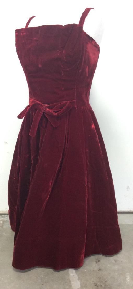 Vintage SUZY PERRETTE Red Toned Velvet Dress: Vintage SUZY PERETTE Red Toned Velvet Dress. Spaghetti strapped dress with layered front and wrap around belt detail. Paper lining interior. Some significant wear including loose stitches and seams, s