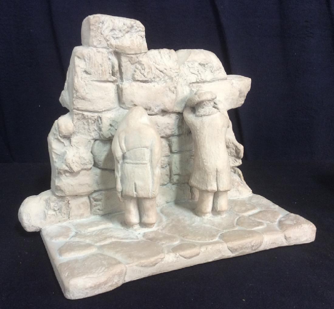 Signed Clay Sculpture Of Figures at Wailing Wall: Signed clay sculpture of two figures standing facing a brick wall. Signed on reverse side Austin Prod Inc 1973. Approximately 10.5 inches in height, 12.5 inches in width Wailing wall, hebraica, judaic