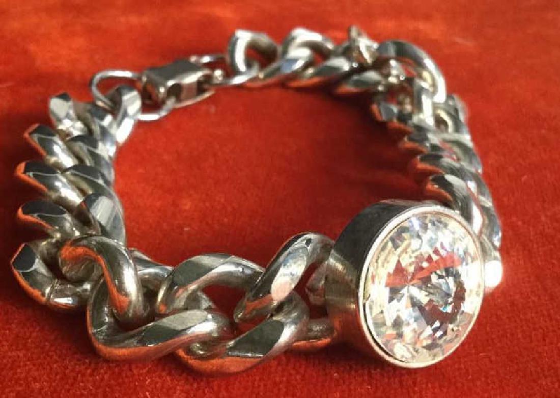 Silver Tone Statement Chain Bracelet W Rhinestone: Silver tone chunky chain link bracelet with statement rhinestone. Bracelet has weight to it. Vintage Jewelry, statement bracelet, costume jewelry. Bracelet length unclasped is approximately 7 inches i