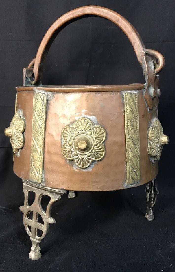 Middle Eastern Brass Copper Pot Vessel: Planter, cache Pot, centerpiece bowl, decorative accessory, mixed metal sculptural, vintage possibly antique, ornately decorated tri footed display piece, with heavy copper handle, measures ht app 15