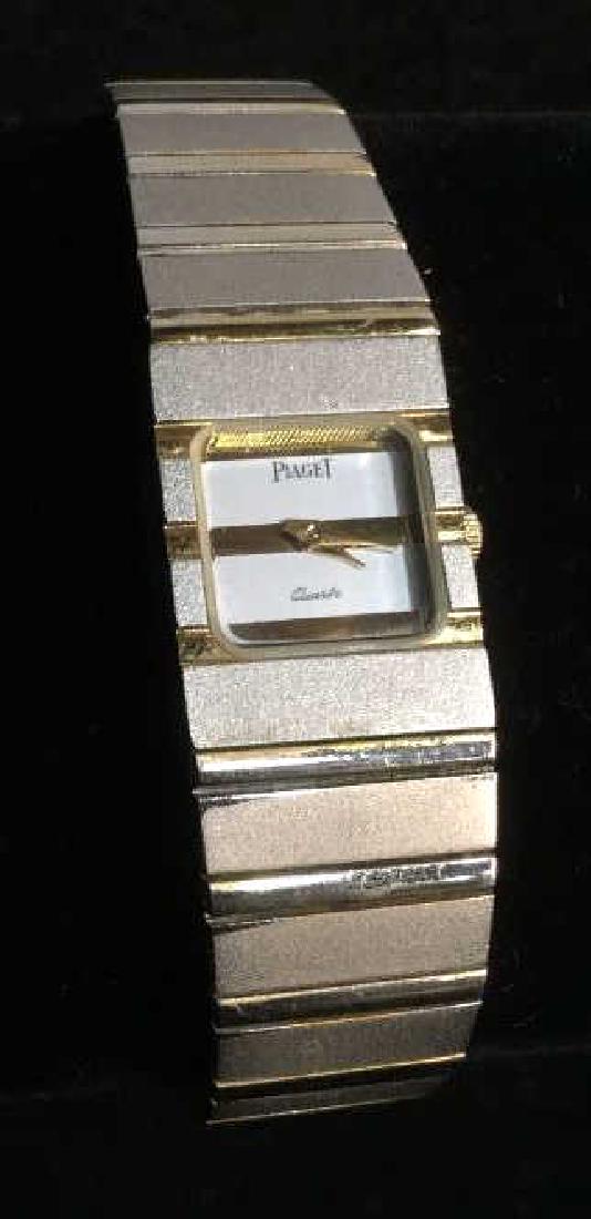 Silver Tone PIAGET Polo Wristwatch: Women’s Men’s Silver Tone PIAGET polo wristwatch. Some gold tones near Watch clockface. Appears as though gold tones had faded near the ends of watch. Jewelry bracelet Wristwatch. Reads ‘Piaget 