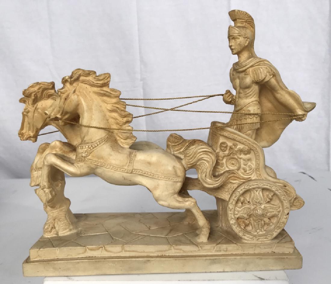 Figural of Roman Gladiator: Figural of Roman Gladiator, in full regalia in chariot pulled by two horses in gallop, reins of gold toned wire, possibly Composite or resin, 9 1/2 x 9 in, x 3 in depth, Good condition, Decorative Cla