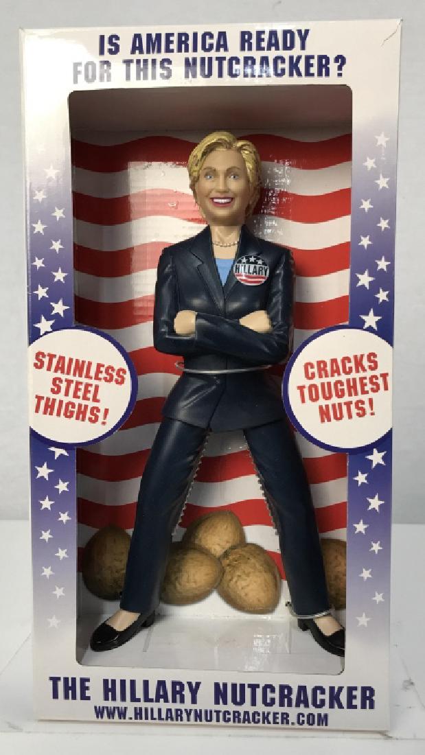 The Hillary Nutcracker Kitchen Utensil: Collectible Political Memorabilia, The Hillary Nutcracker Kitchen Tool, in original box, Hillary formed as a leather clad jumpsuit, with nut cracking teeth for thighs, says with stainless steel thighs