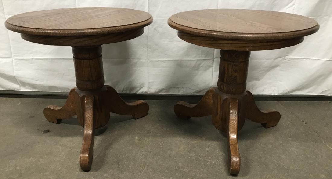 Pair Wooden Oak Side Tables W Pedestal Base: Pair Wooden Oak Side Tables W Pedestal Base, solidly constructed, tripod base, surface wear to top and minor nicks to base and legs. Measures approx 21 inches tall x 22 inches in diameter. Property of