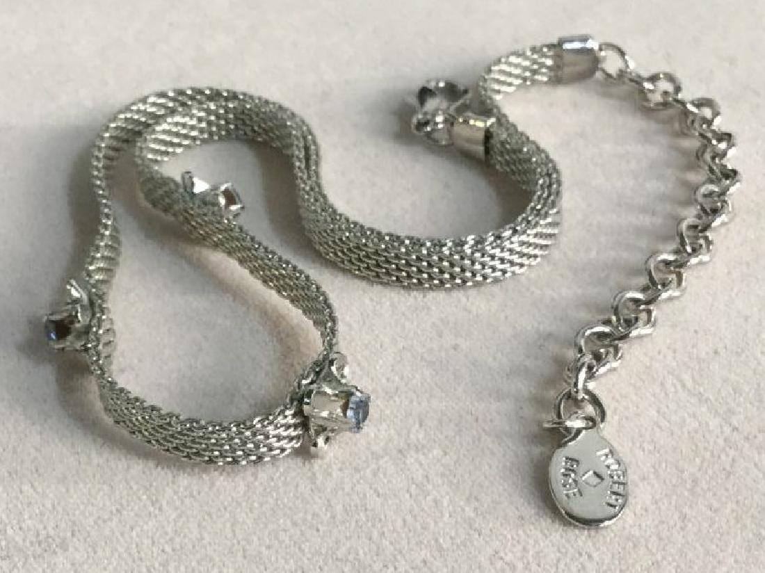 ROBERT ROSE Flower Detailed Choker Necklace: ROBERT ROSE Silver Tone herringbone choker necklace with three flower details. Flowers have blue rhinestones in centers. Vintage Jewelry, statement necklace, costume jewelry. Drop length of necklace s