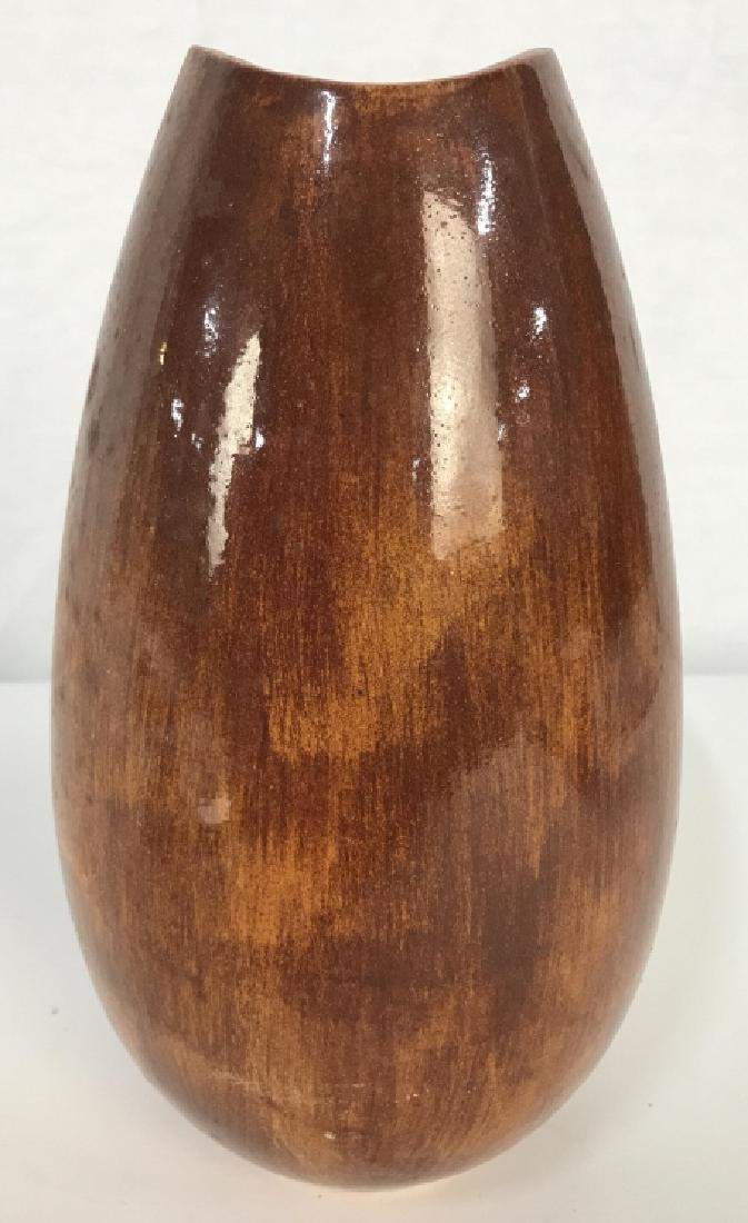 Light Brown Toned Ceramic Vase: Light Brown Toned Ceramic Vase. Measures approx 10 inches tall 6 inches wide. Contains some wear and scratches. Vessel, vase, home decor, tableware, decorative tabletop accessory. 6