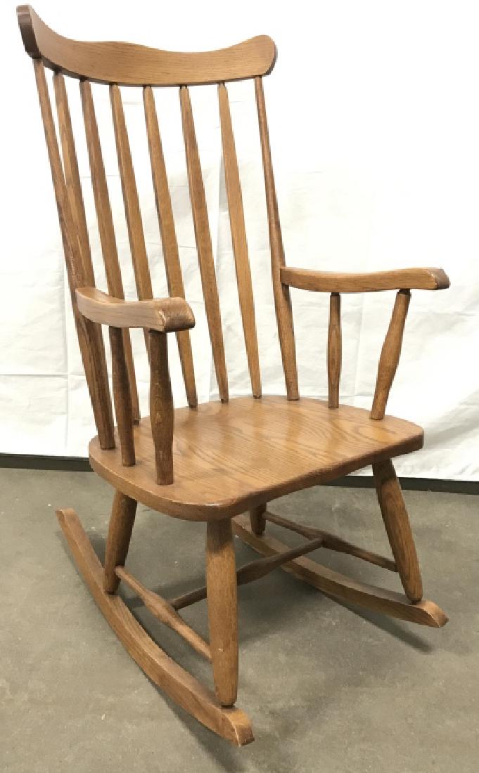 Oak Rocking Chair: Wooden Oak Rocking Chair In good condition. Measures approx 40 inches tall x 22 inches wide x 29.25 inches deep. Good condition. Property of Greenwhich, CT Estate. Rocking chair, home furnishing, home