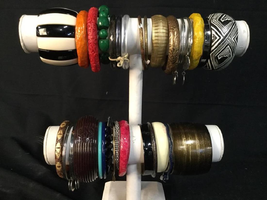 Over 30 Vintage Bangle Bracelets Jewelry: Enamel, Wood, Bakelite, Metal, Copper, Silver Toned, some with charms, some stretch widest app 2 inches, stand not included, group Lot vintage jewelry, estate jewelry, costume jewelry