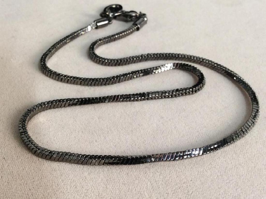 GIVENCHY Black Tone Herringbone Strand Necklace: GIVENCY Black Tone herringbone Strand Necklace. Minimalist jewelry. Tag marked G for GIVENCHY on end on clasp. Vintage Jewelry, statement necklace, costume jewelry. Drop length of necklace strand appr