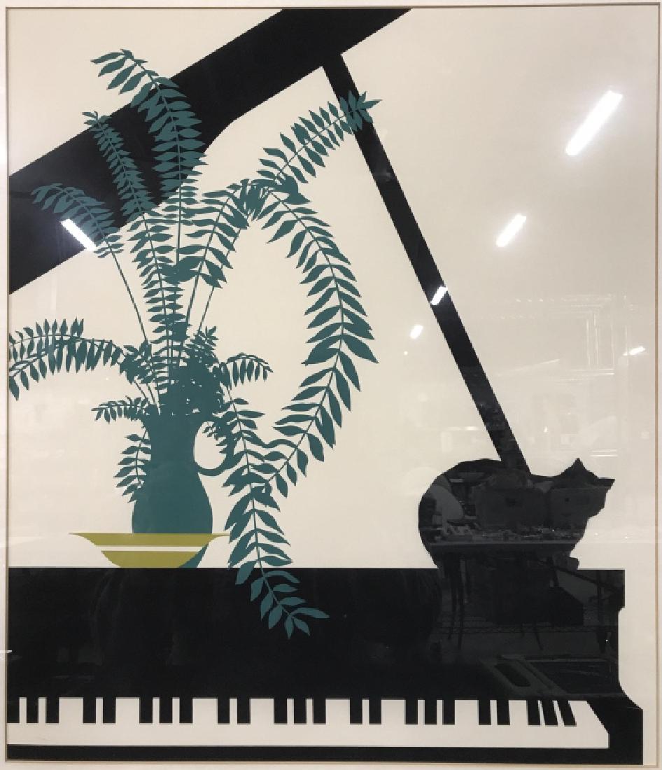 Framed Cat On A Piano Artwork: Artwork Depict a cat lying on a piano. Piece is possibly a lithograph. Contains tones of teal, olive, black and white. Piece is professionally framed with silver toned frame. Measures approx 25 inches
