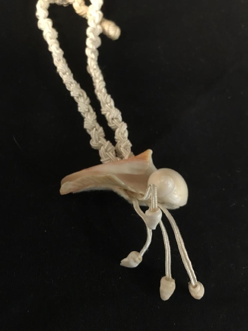 Group Lot 5 Vintage Shell Jewelry: Lot includes two long shell necklaces longest drop app 17 inches, one shell pendant necklace, two shell bracelets, vintage jewelry