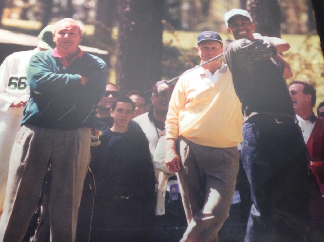 Framed Photo Print Of Professional Golfers: Photo print depicts Jack Nicklaus Arnold Palmer & Tiger Woods. Piece is framed in black toned metallic frame. Some marks on frame. Golf Collectibles, Sports collectibles, Sports Memorabilia. Measures