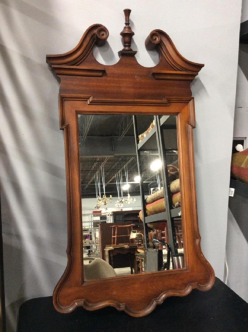 Pier Mirror W Carved Wooden Frame: Pier mirror with carved wooden frame. Top finial is detached from structure and needs repair. Some scratches on wood surface. Minor chip in mirror along top edge. Approximately 44 inches in height by 