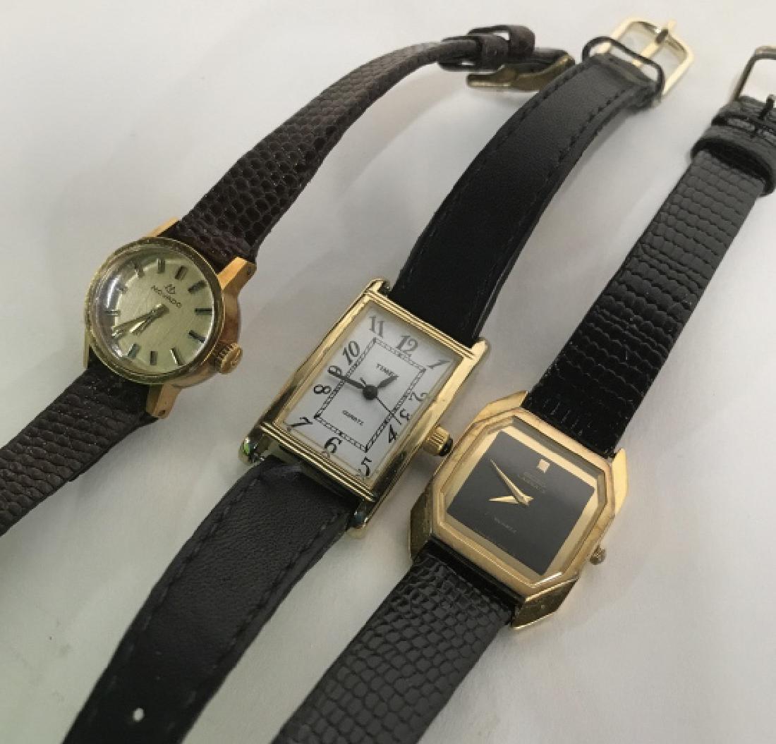 Group 3 Vintage Ladies Wristwatches: Three watches, vintage ladies fashion accessories, wrist watches, one marked for Movado, one for Times, and one for SEIKO, poss leather bands, jewelry, longest app 8 inches