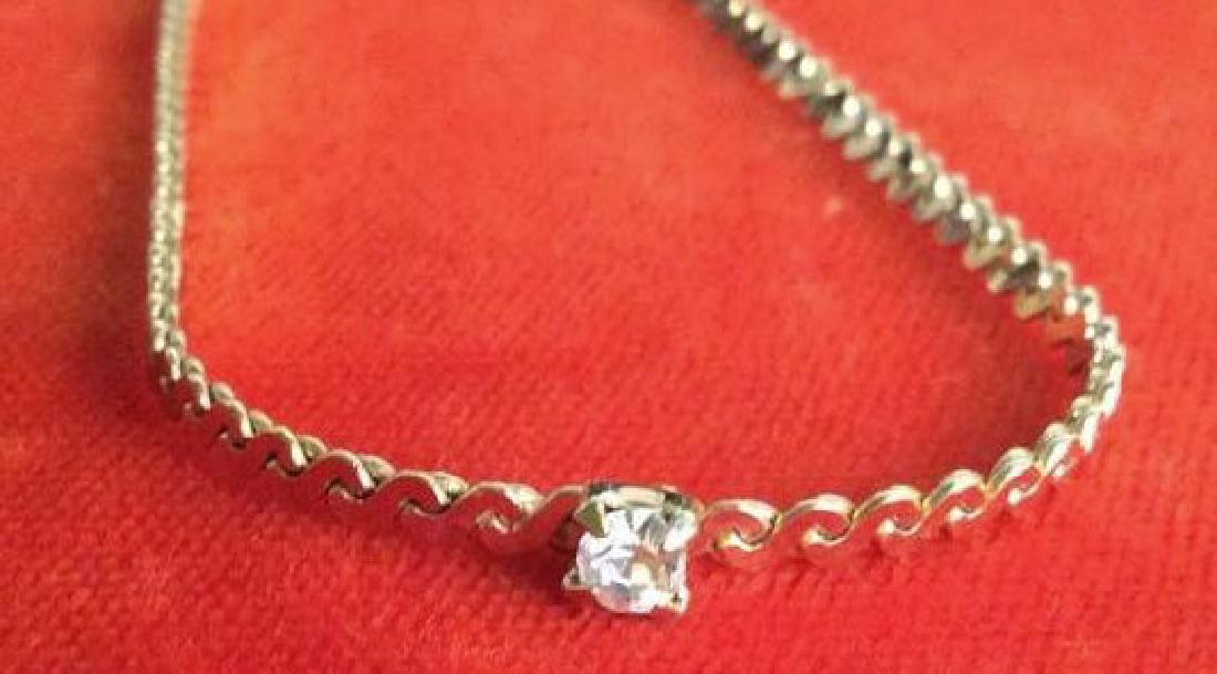 Vintage NAPIER Chain Necklace W Single Rhinestone: Vintage NAPIER gold tone chain choker necklace with single rhinestone embellishment in center. NAPIER marked on end of clasp. Vintage Jewelry, statement necklace, costume jewelry. Drop length of neckl